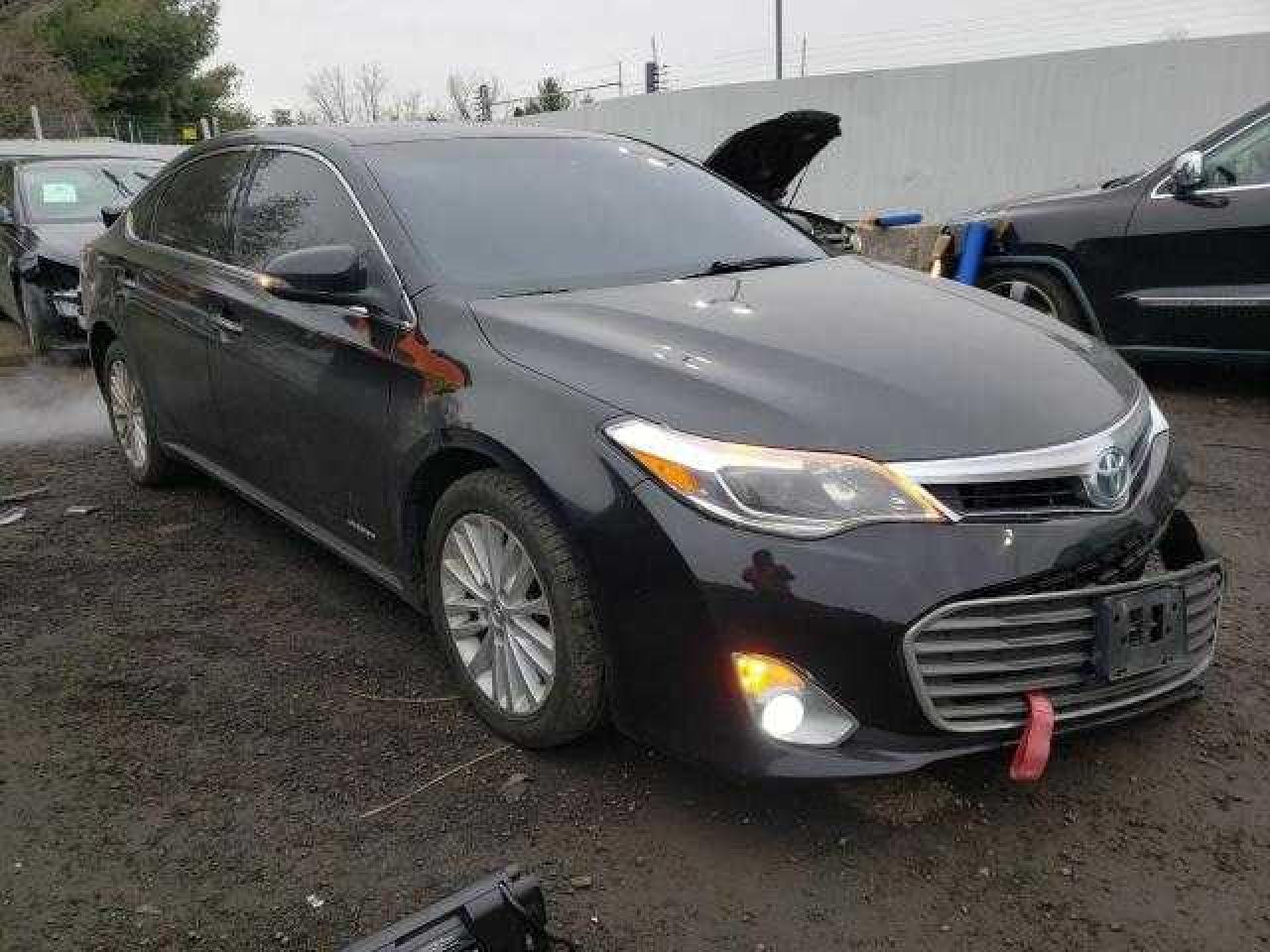 TOYOTA AVALON HYB 2014 with VIN 4T1BD1EBXEU024654 - Photo from auction