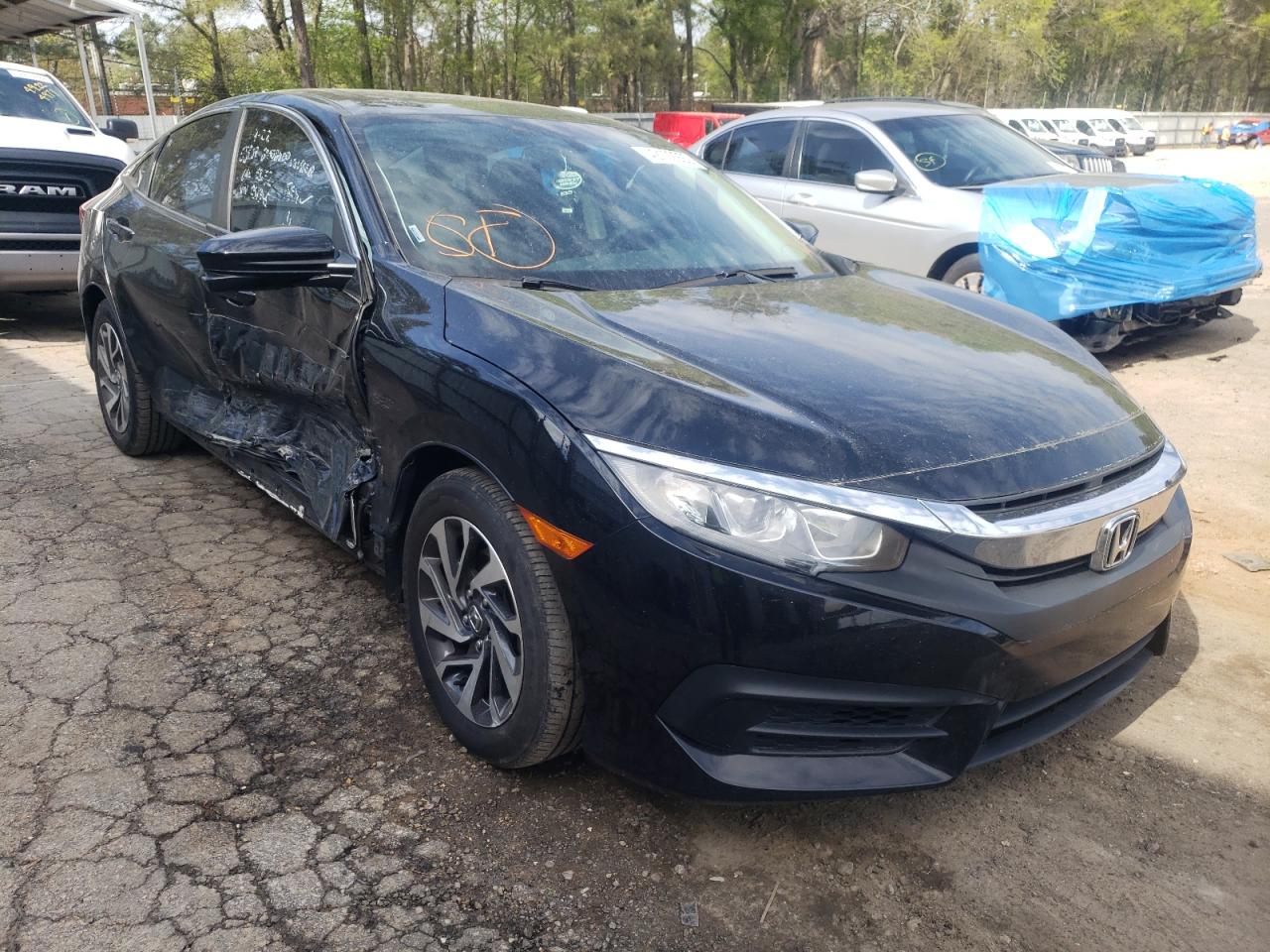 HONDA CIVIC EX 2016 with VIN 19XFC2F7XGE051346 - Photo from auction