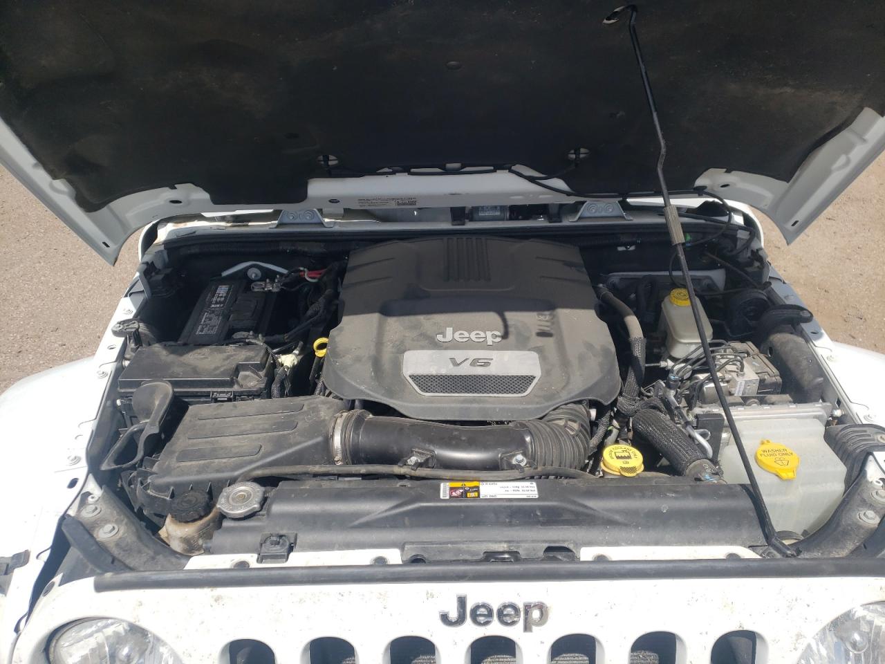Photo 7 from auction – 2014 JEEP WRANGLER U with VIN 1C4BJWFGXEL261638