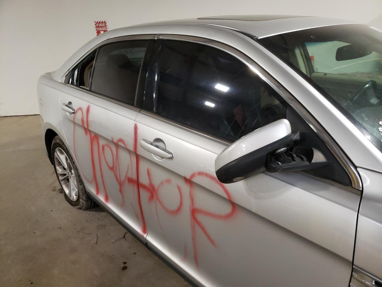 Photo 9 from auction – 2013 FORD TAURUS SEL with VIN 1FAHP2E90DG181198