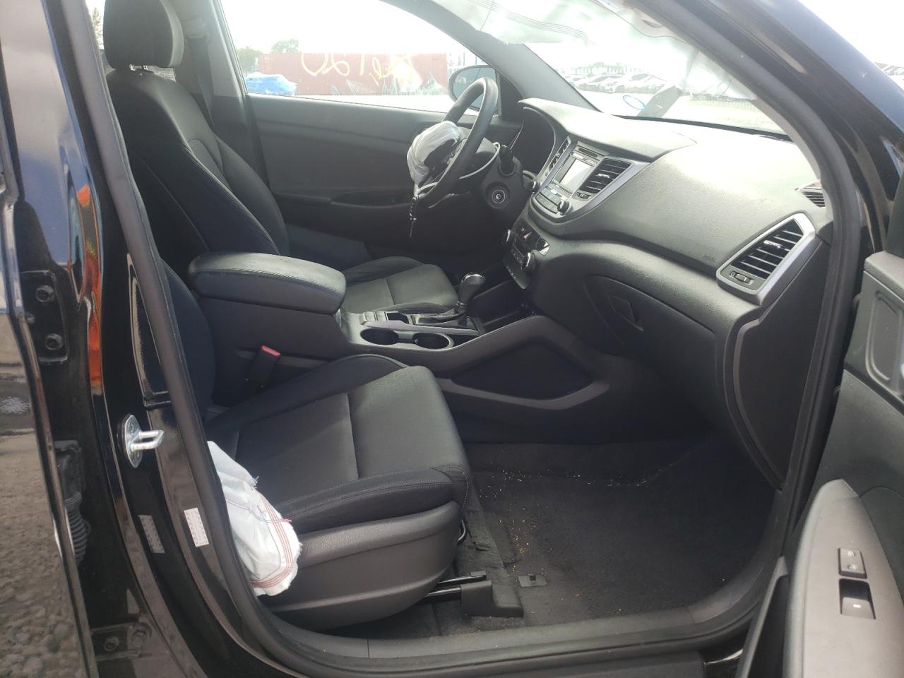 Photo 5 from auction – 2016 HYUNDAI TUCSON SE with VIN KM8J23A46GU190340