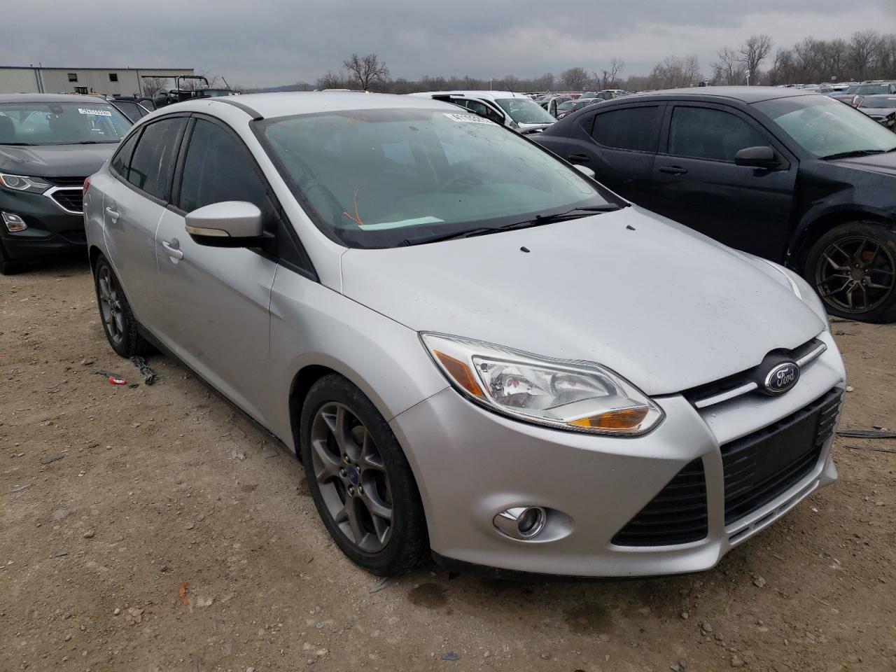 FORD FOCUS SE 2014 with VIN 1FADP3F25EL209141 - Photo from auction