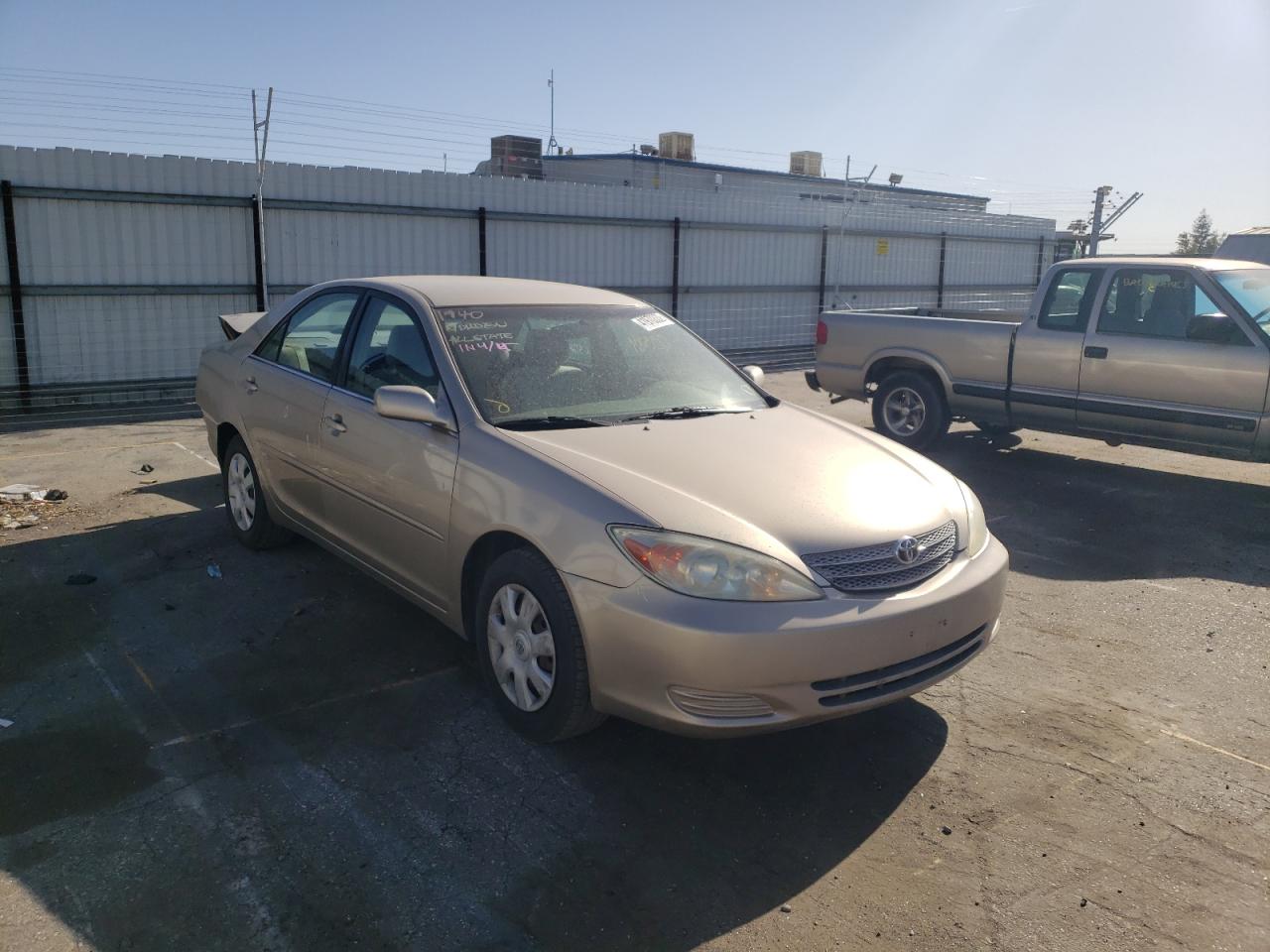TOYOTA CAMRY LE 2002 with VIN JTDBE32K720050276 - Photo from auction