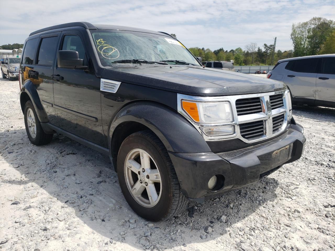 DODGE NITRO SLT 2009 with VIN 1D8GU58K89W555540 - Photo from auction