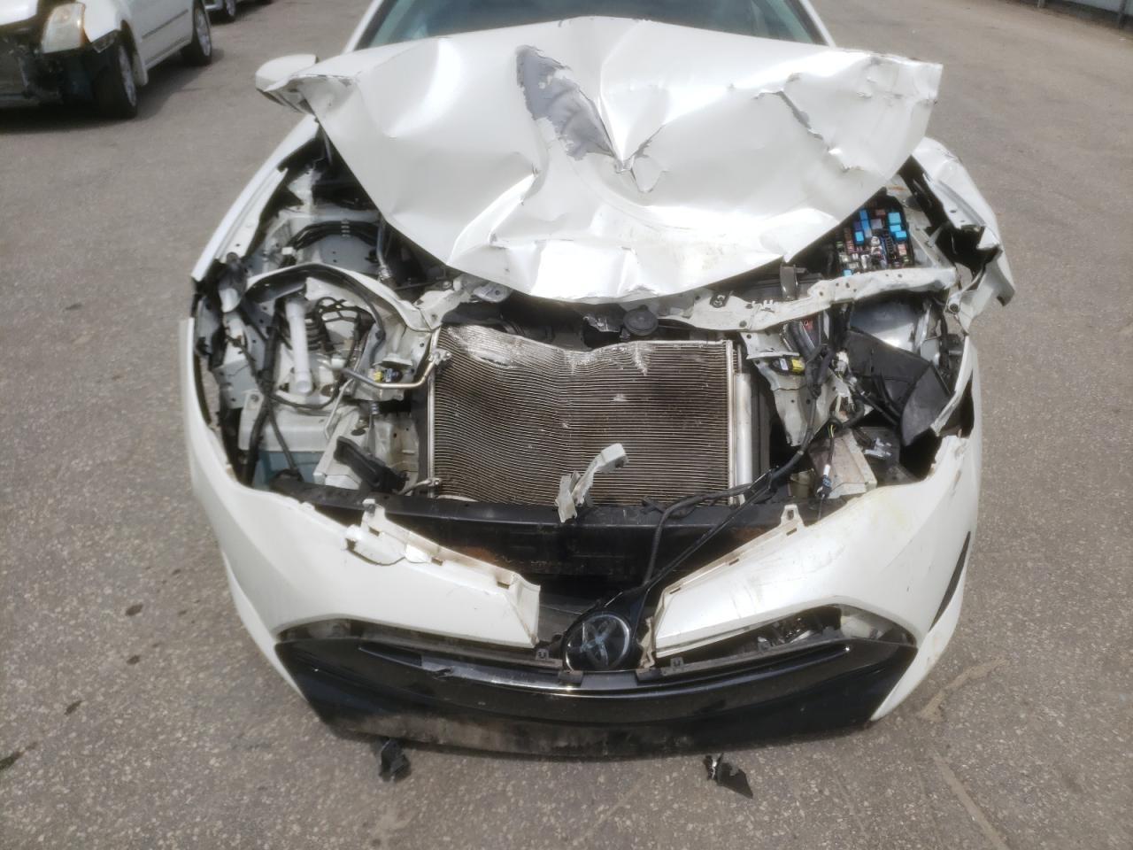 Photo 9 from auction – 2017 TOYOTA COROLLA L with VIN 5YFBURHE4HP649058
