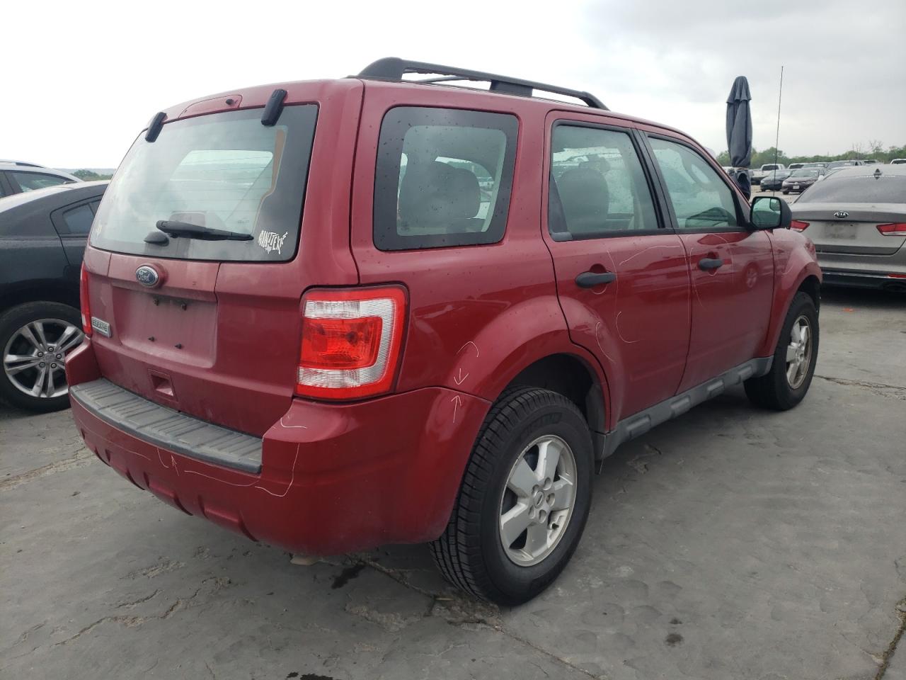 Photo 4 from auction – 2011 FORD ESCAPE XLS with VIN 1FMCU0C75BKC10218