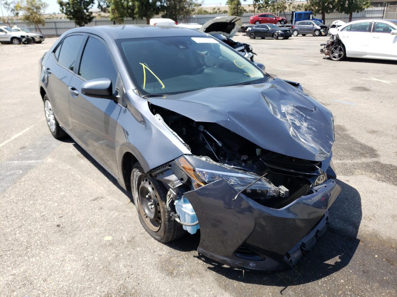 TOYOTA COROLLA L 2018 with VIN 5YFBURHEXJP748991 - Photo from auction