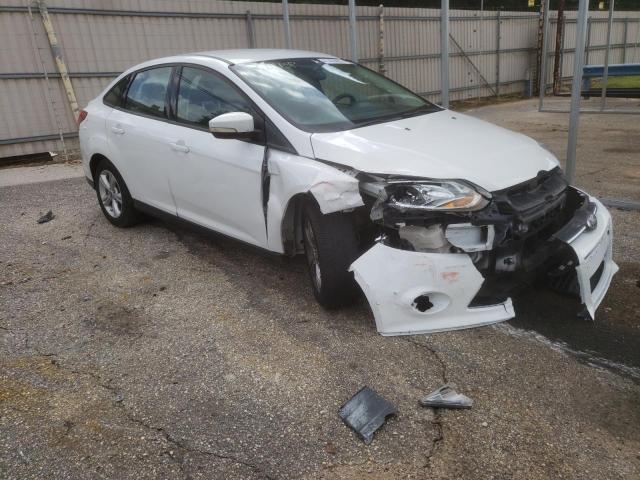 FORD FOCUS SE 2013 with VIN 1FADP3F21DL267214 - Photo from auction