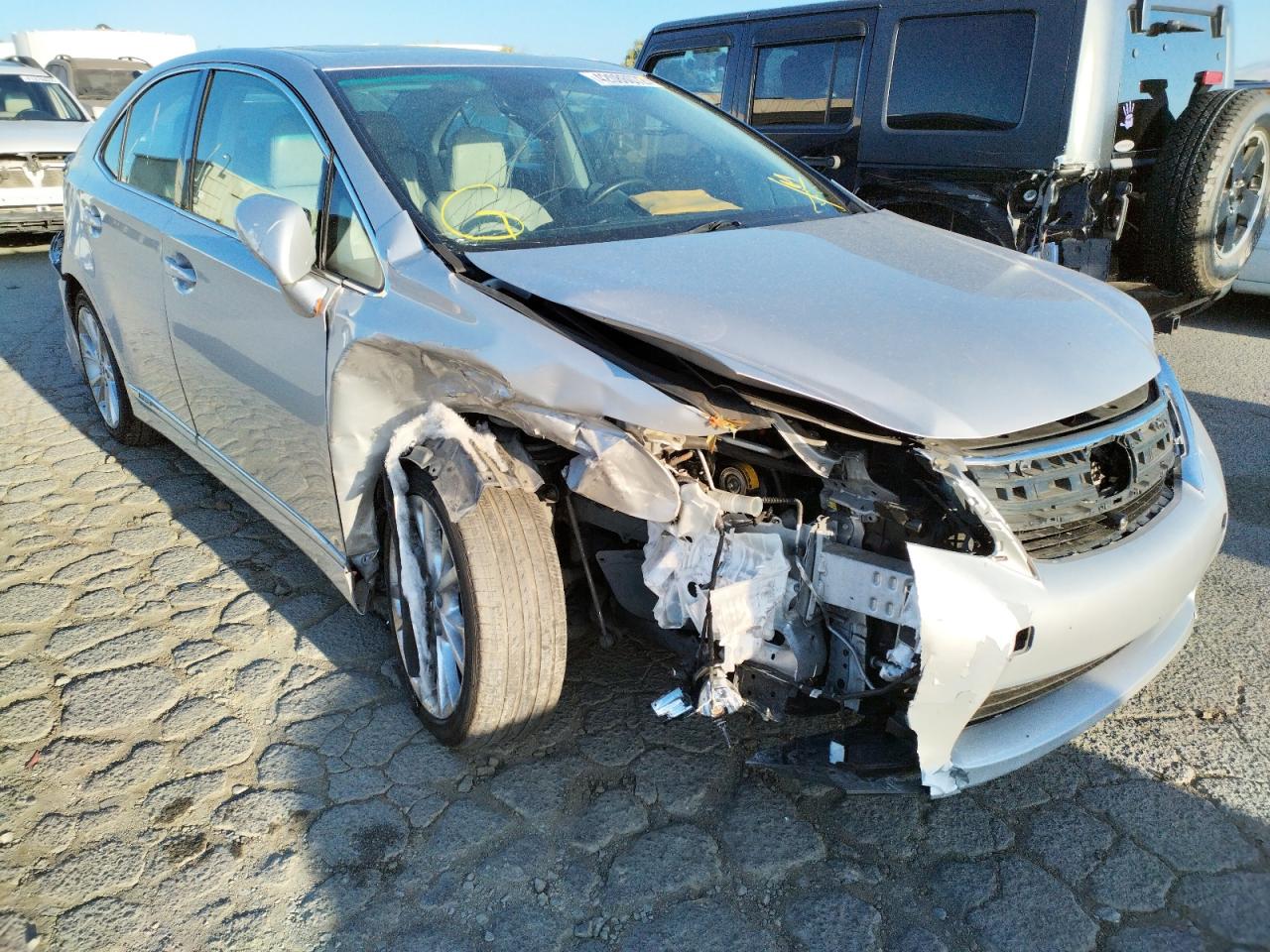 LEXUS HS 250H 2010 with VIN JTHBB1BAXA2034692 - Photo from auction
