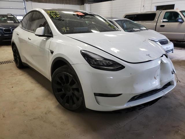 TESLA MODEL Y 2021 with VIN 5YJYGDEEXMF079744 - Photo from auction
