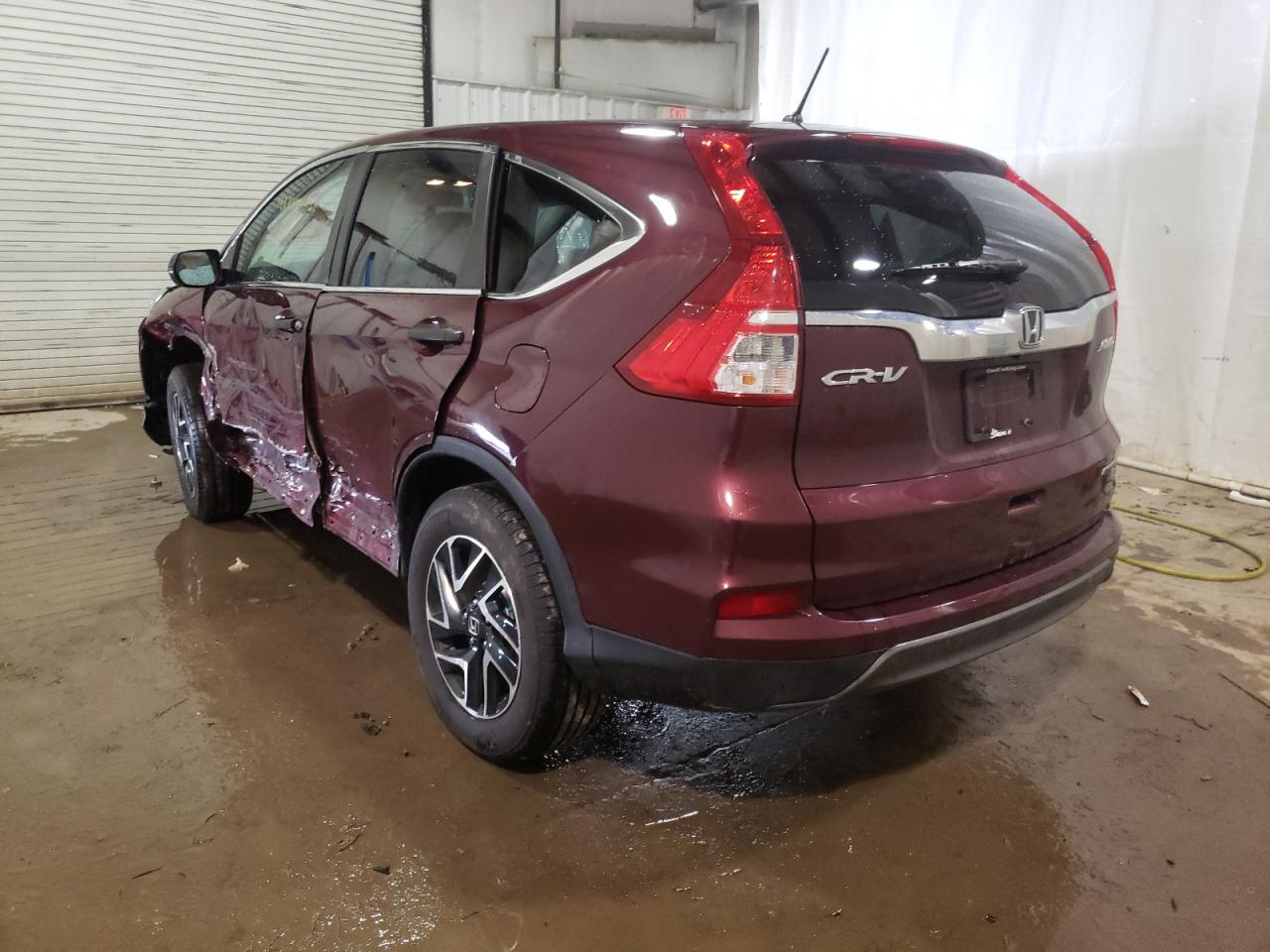 Photo 3 from auction – 2016 HONDA CR-V SE with VIN 5J6RM4H45GL048820