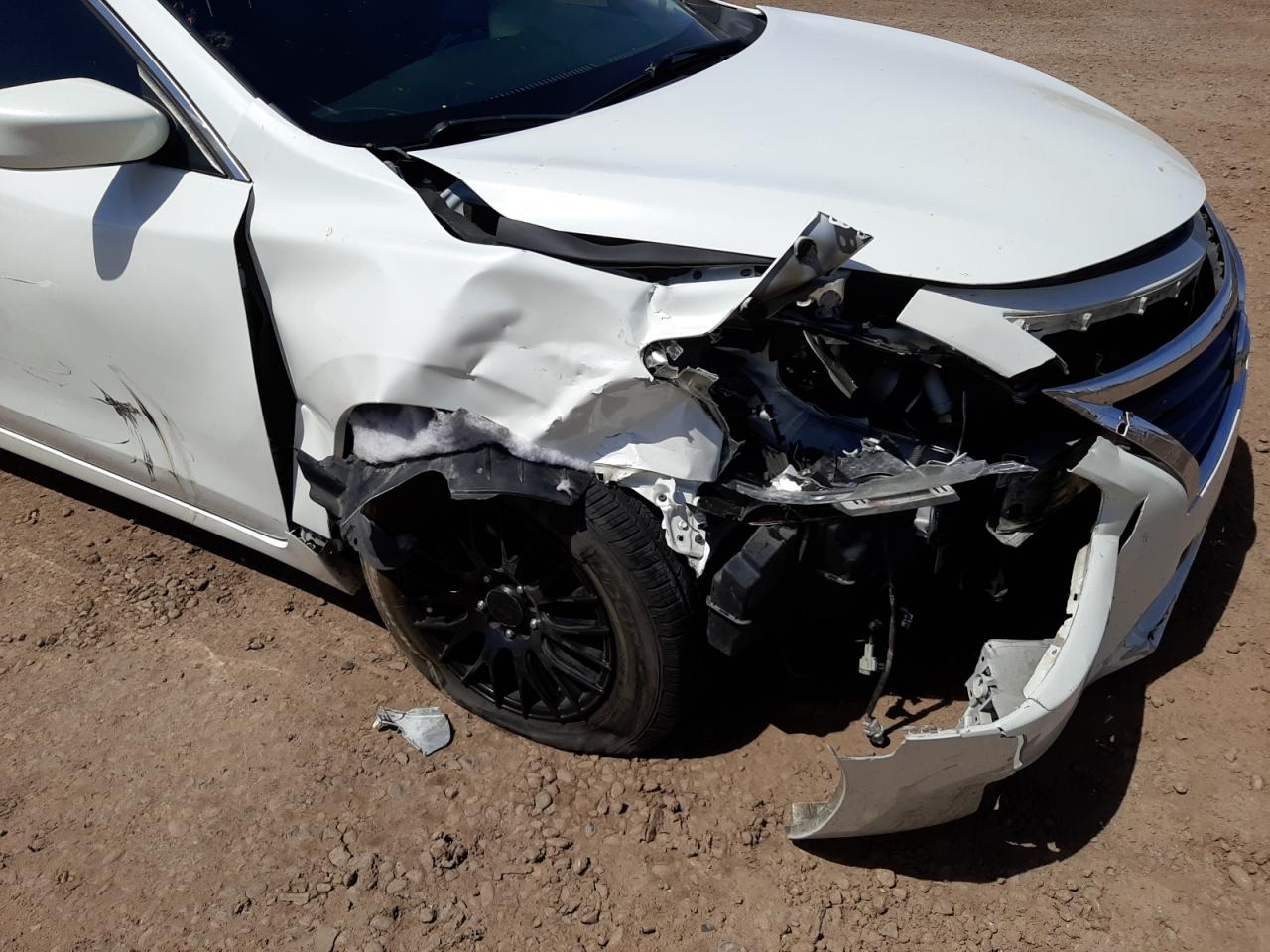 Photo 9 from auction – 2014 NISSAN ALTIMA 2.5 with VIN 1N4AL3AP5EN230089