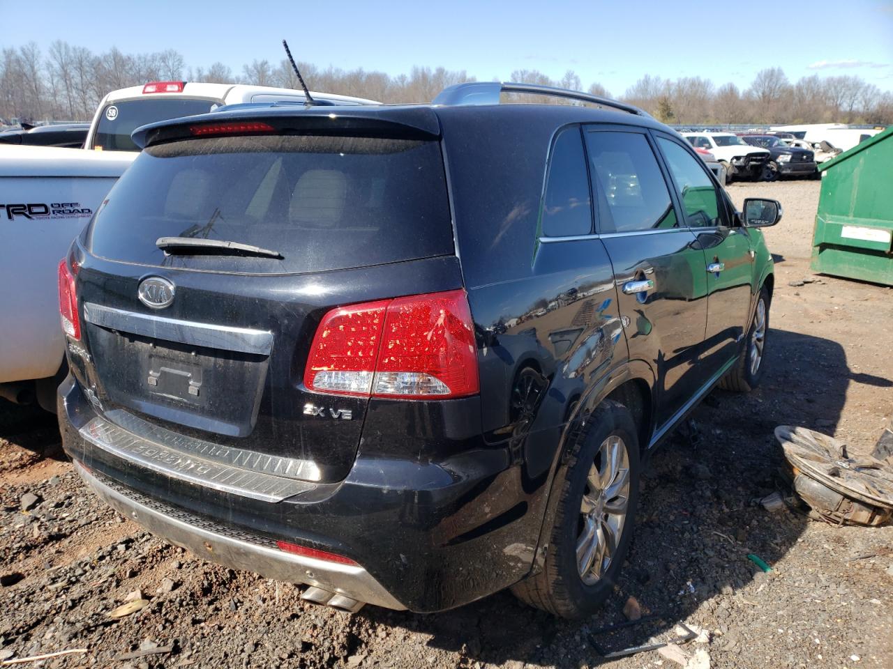 Photo 4 from auction – 2011 KIA SORENTO SX with VIN 5XYKWDA24BG097912