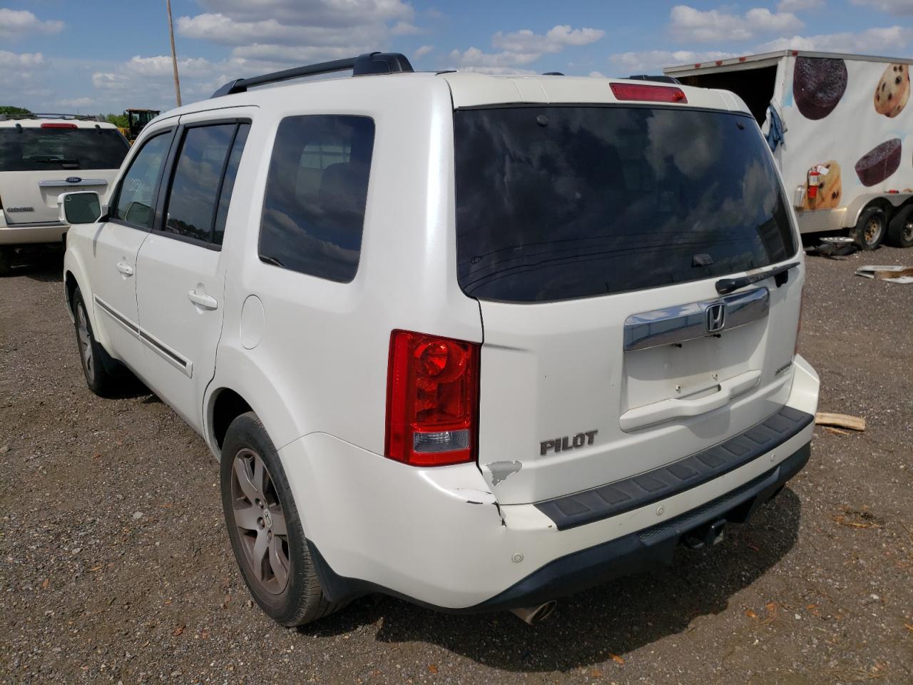 Photo 3 from auction – 2013 HONDA PILOT TOUR with VIN 5FNYF3H95DB001707
