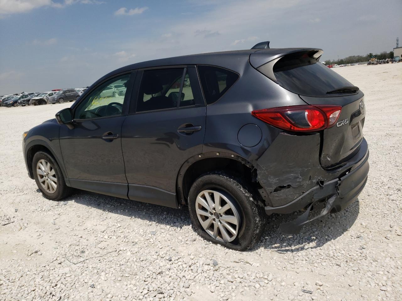 Photo 9 from auction – 2014 MAZDA CX-5 TOURI with VIN JM3KE2CY2E0356763