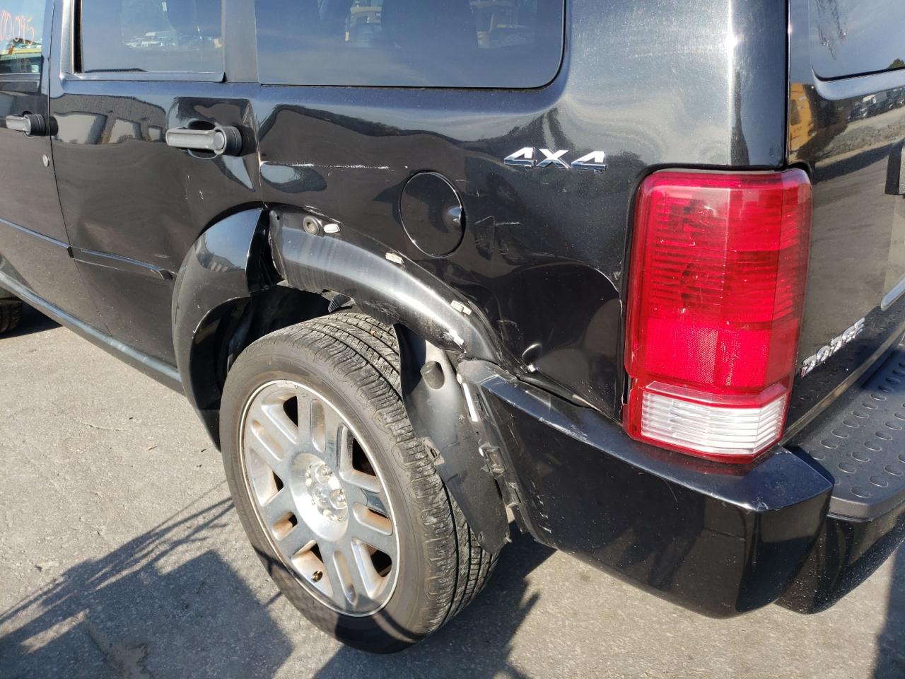 Photo 9 from auction – 2011 DODGE NITRO HEAT with VIN 1D4PU4GK8BW600057