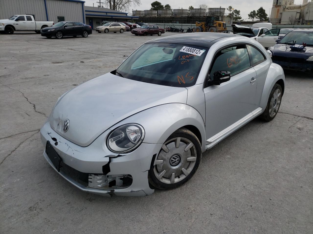 Photo 2 from auction – 2012 VOLKSWAGEN BEETLE with VIN 3VWJX7AT2CM658340