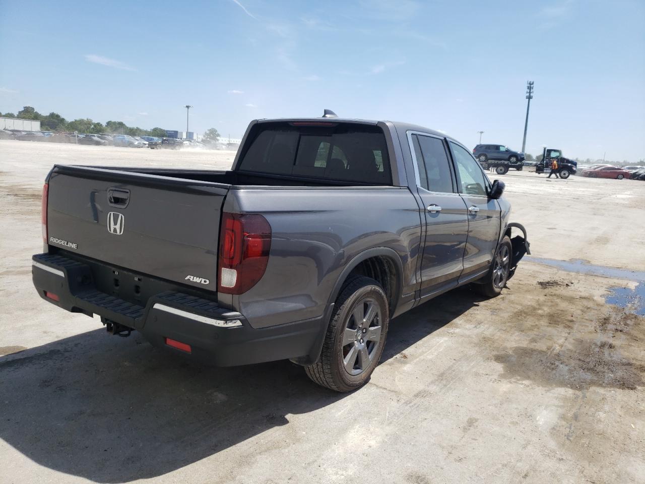 Photo 4 from auction – 2020 HONDA RIDGELINE with VIN 5FPYK3F70LB006445