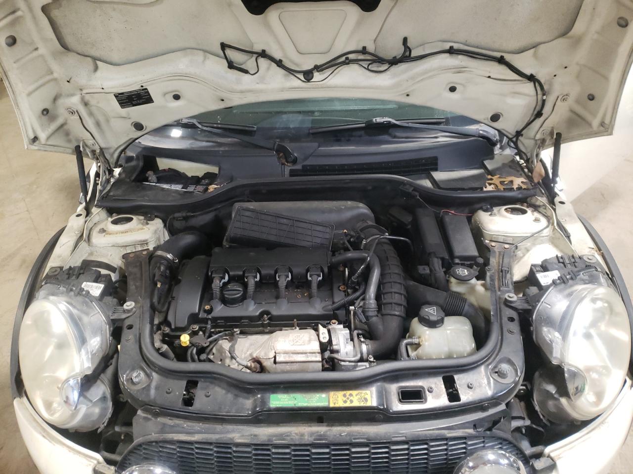 Photo 7 from auction – 2007 MINI COOPER S with VIN WMWMF735X7TL92278