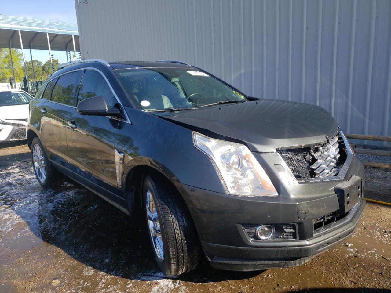CADILLAC SRX PREMIU 2014 with VIN 3GYFNDE34ES570647 - Photo from auction