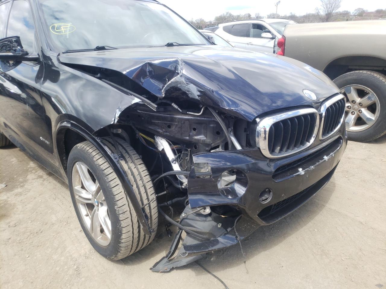 Photo 9 from auction – 2015 BMW X5 XDRIVE3 with VIN 5UXKR0C5XF0K71483