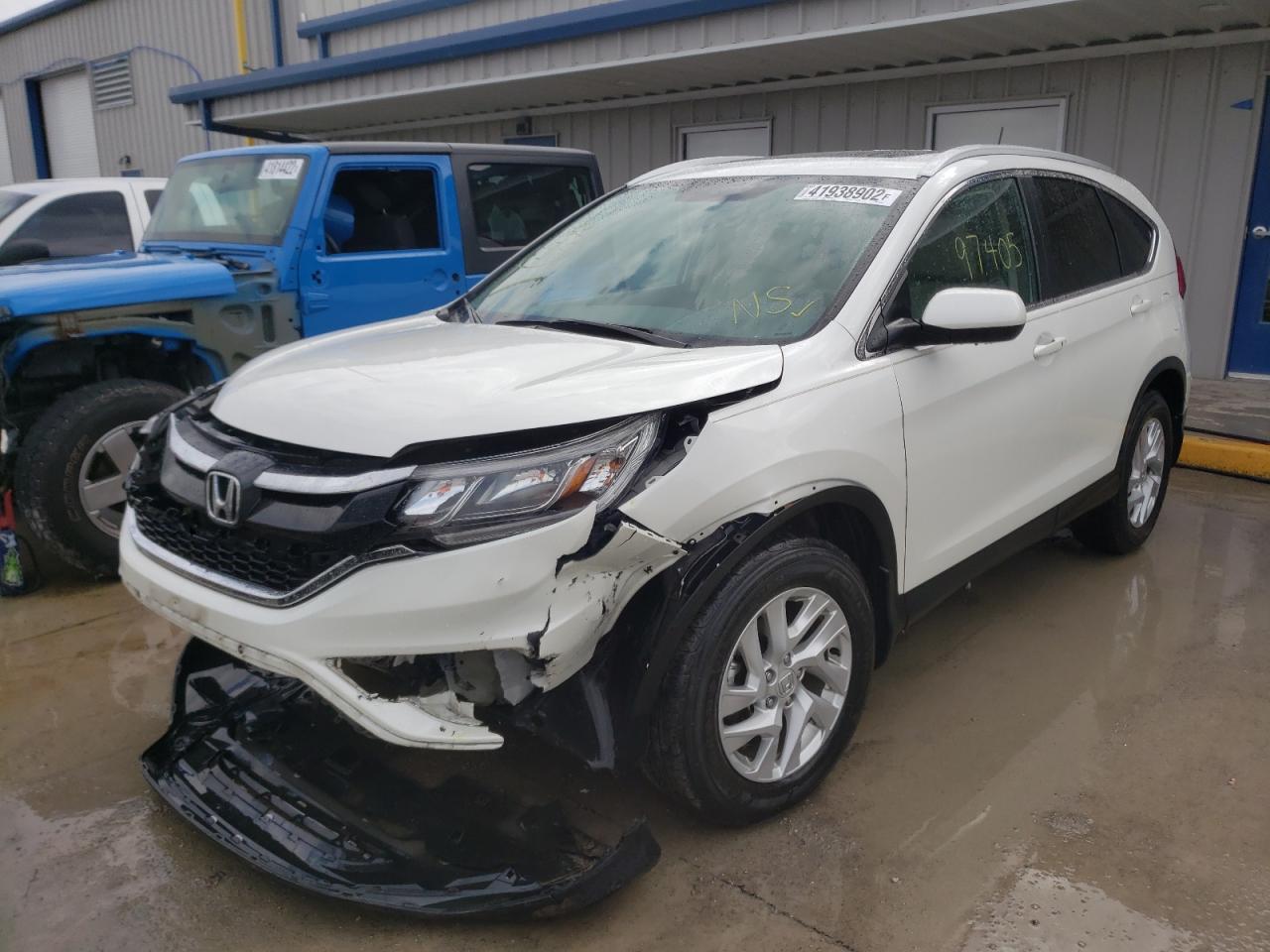Photo 2 from auction – 2016 HONDA CR-V EXL with VIN 5J6RM4H70GL016092