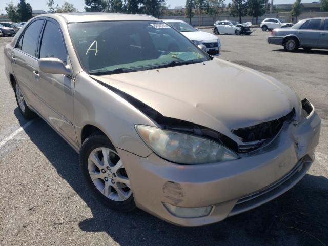 TOYOTA CAMRY LE 2005 with VIN 4T1BF32K65U604526 - Photo from auction