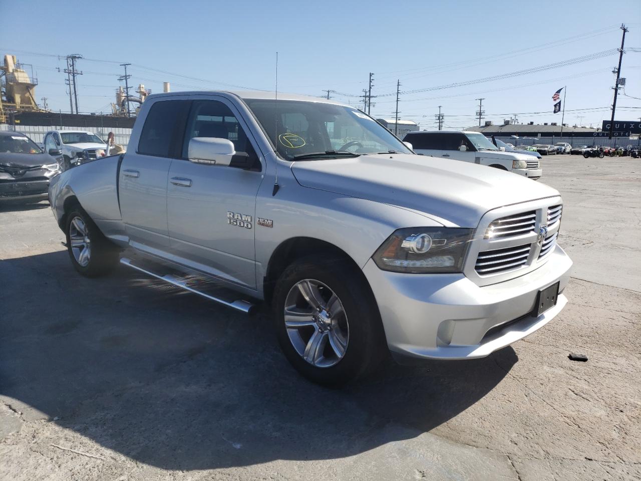 RAM 1500 SPORT 2014 with VIN 1C6RR6HTXES170576 - Photo from auction