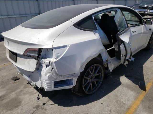 Photo 9 from auction – 2021 TESLA MODEL 3 with VIN 5YJ3E1EA5MF992505