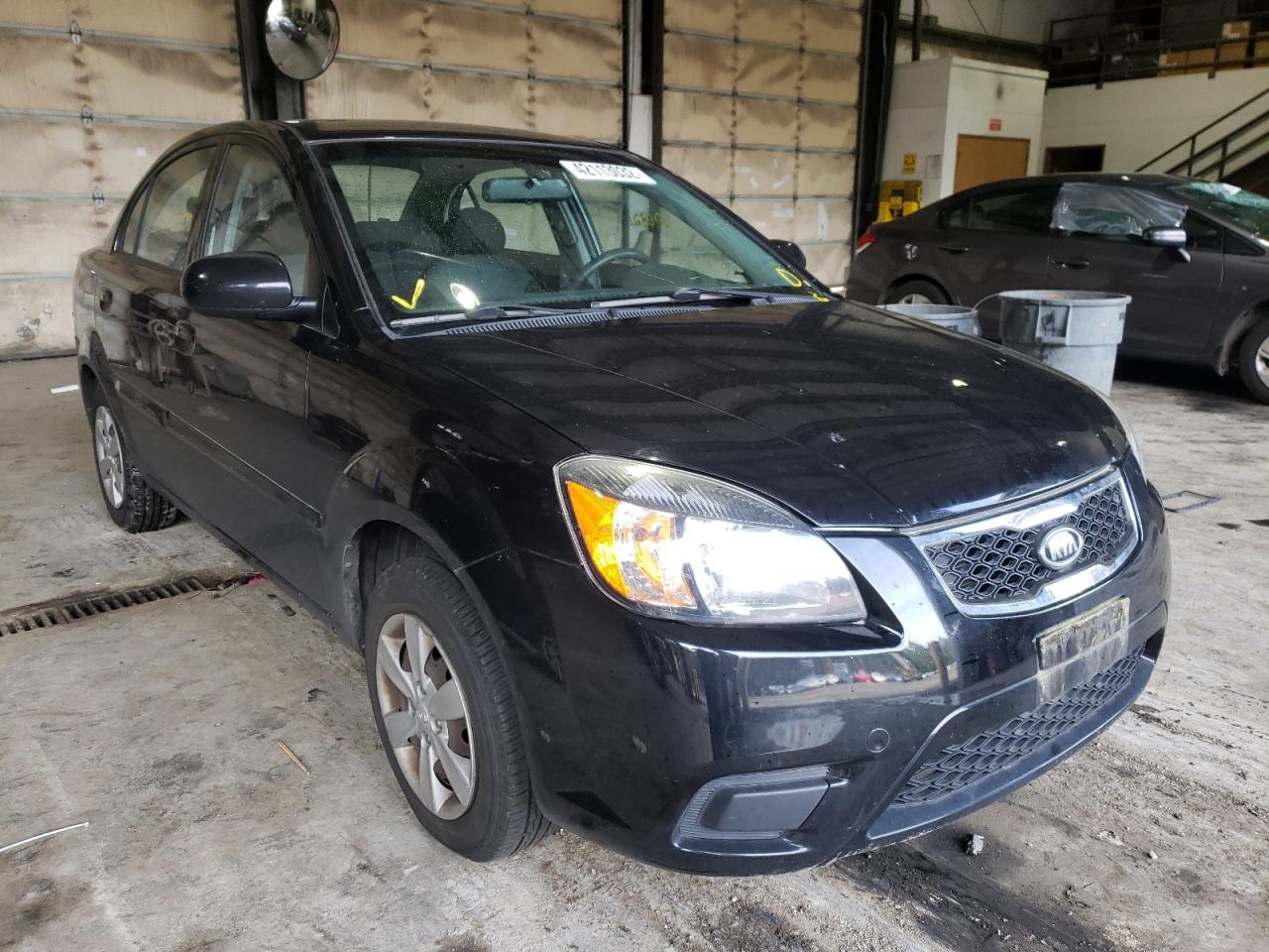 KIA RIO BASE 2011 with VIN KNADH4A36B6932842 - Photo from auction