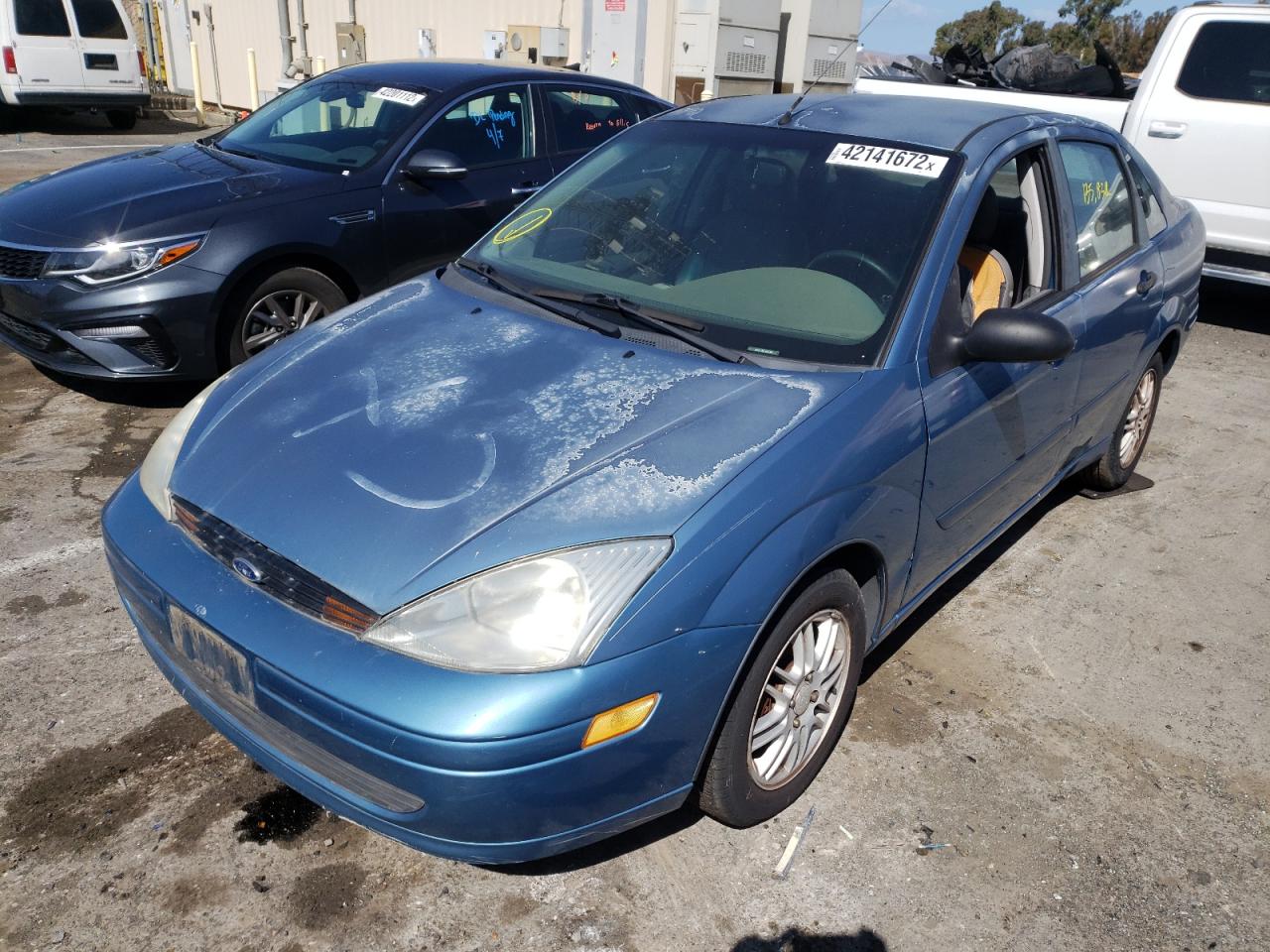 Photo 2 from auction – 2004 FORD FOCUS with VIN 1FAHP3833YW136233