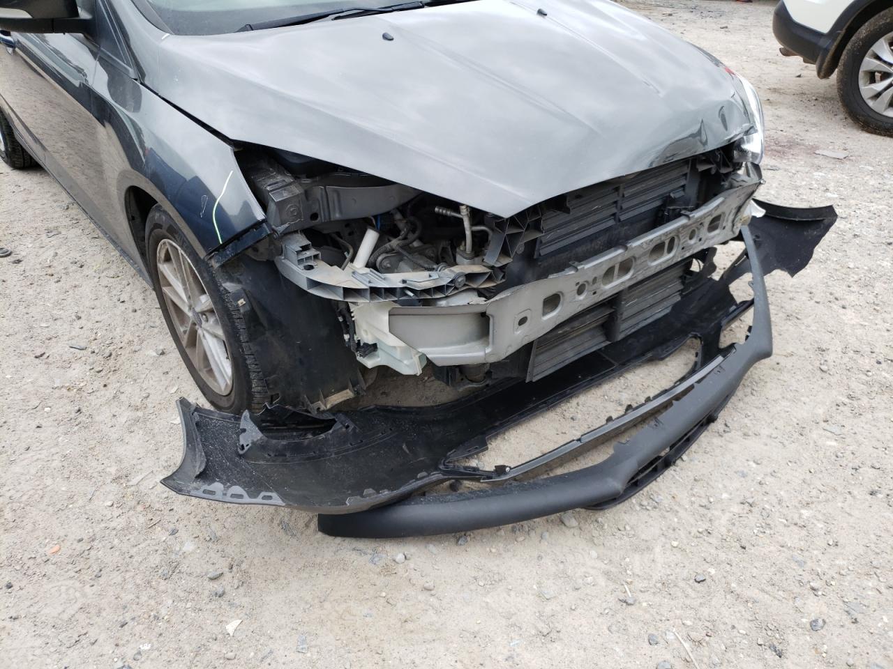 Photo 10 from auction – 2017 FORD FOCUS SE with VIN 1FADP3K25HL276851