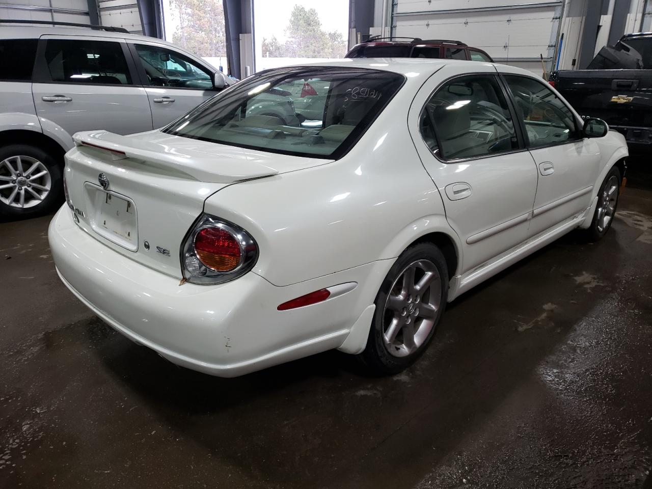 Photo 4 from auction – 2003 NISSAN MAXIMA GLE with VIN JN1DA31A93T430817