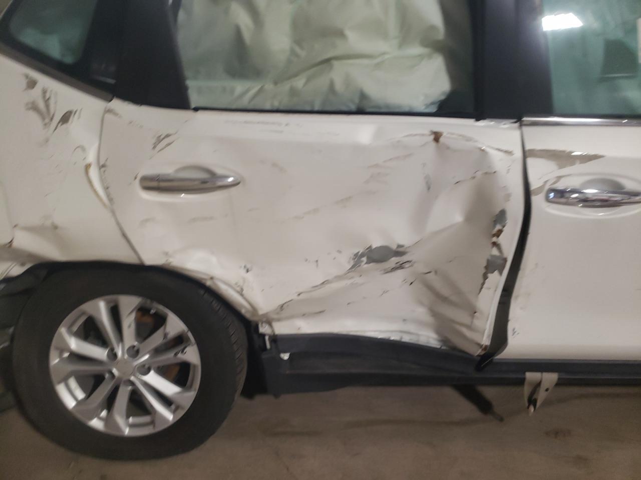 Photo 9 from auction – 2014 NISSAN ROGUE S with VIN 5N1AT2MT3EC761120