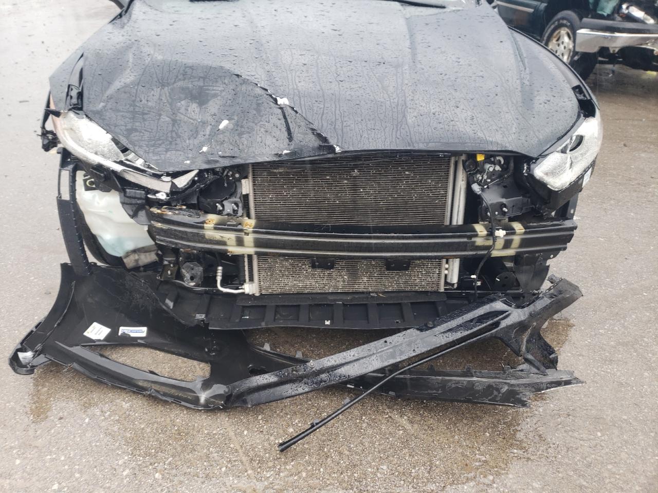 Photo 9 from auction – 2016 FORD FUSION S with VIN 3FA6P0G76GR210451