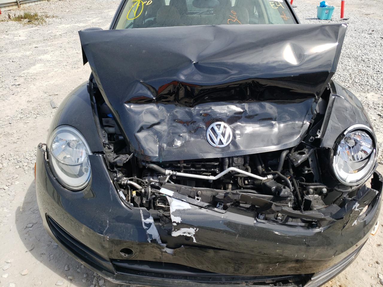 Photo 7 from auction – 2013 VOLKSWAGEN BEETLE with VIN 3VWJX7AT7DM613198
