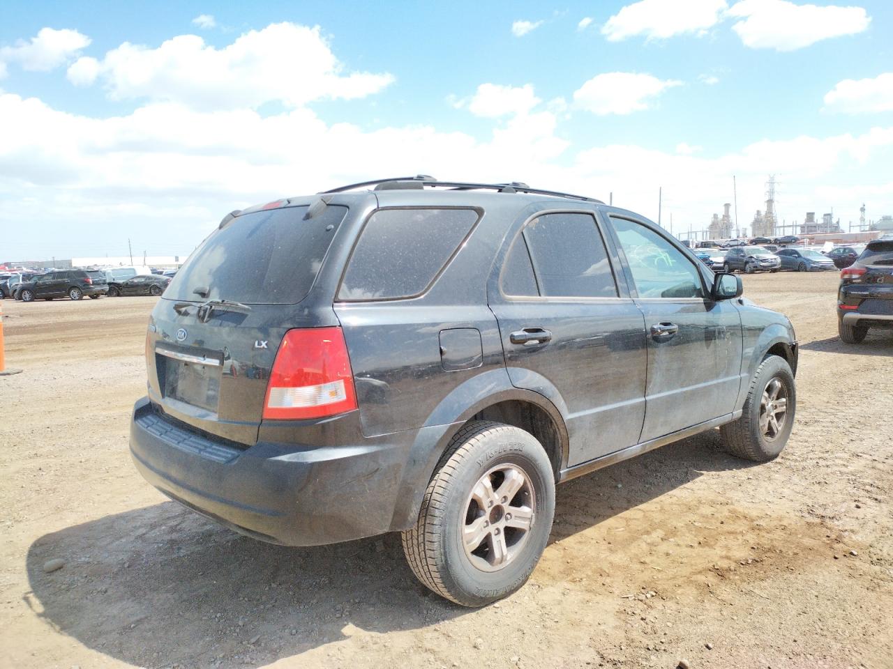 Photo 4 from auction – 2005 KIA SORENTO EX with VIN KNDJD733555487133