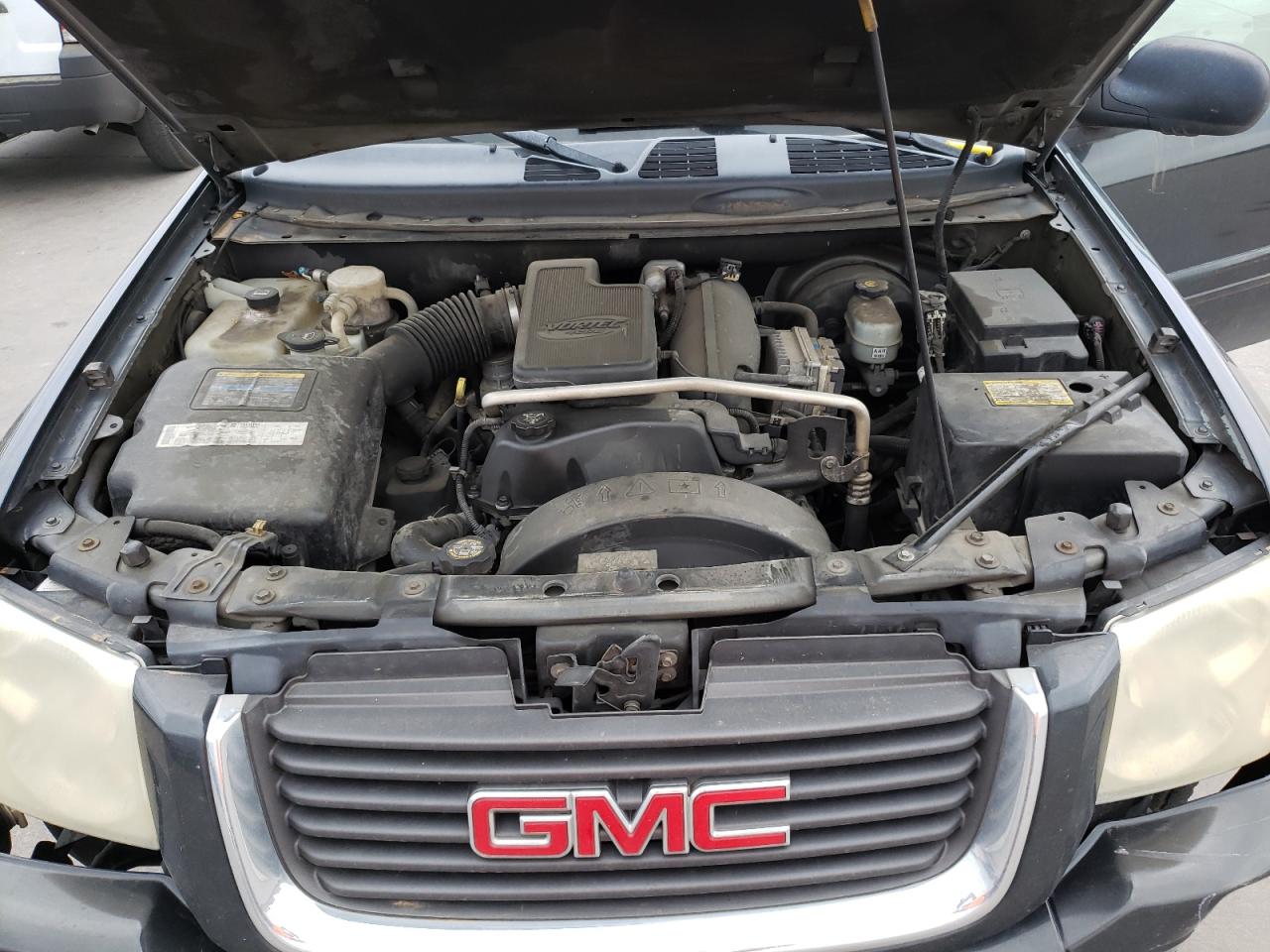 Photo 7 from auction – 2004 GMC ENVOY with VIN 1GKDS13S242238171
