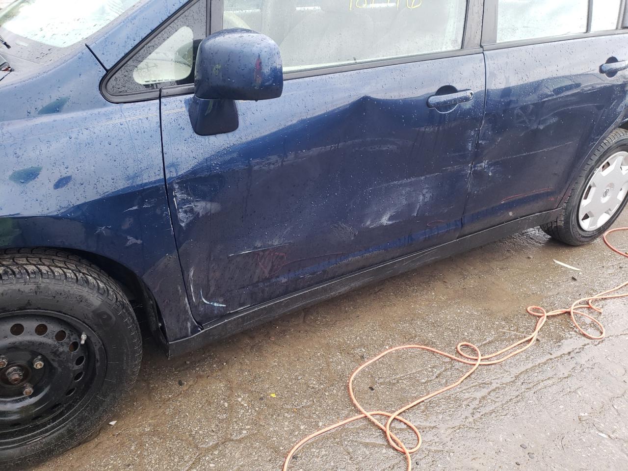 Photo 9 from auction – 2007 NISSAN VERSA S with VIN 3N1BC13E47L403685