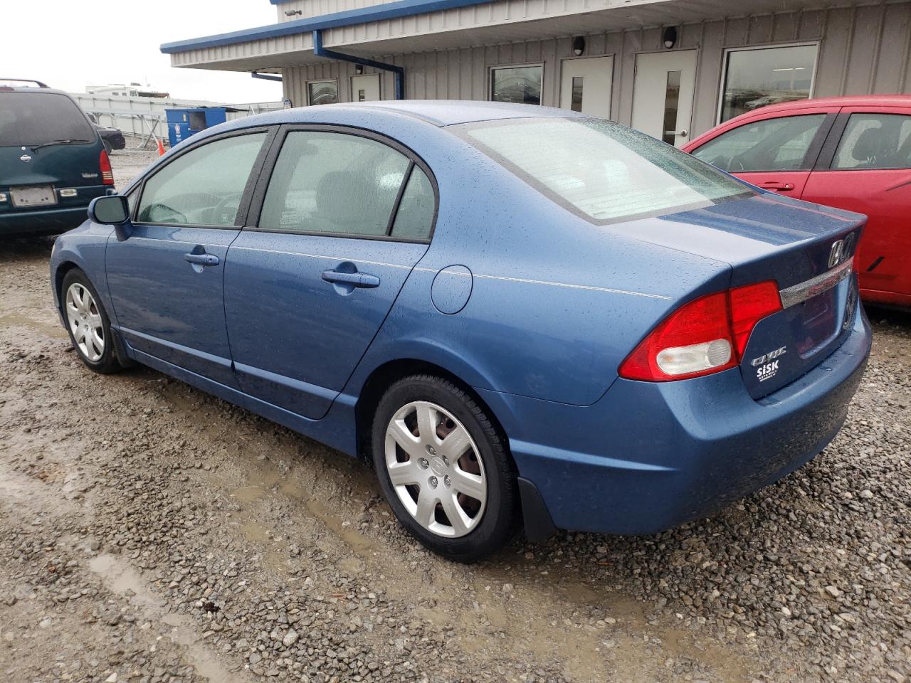 Photo 3 from auction – 2010 HONDA CIVIC LX with VIN 19XFA1F58AE031912