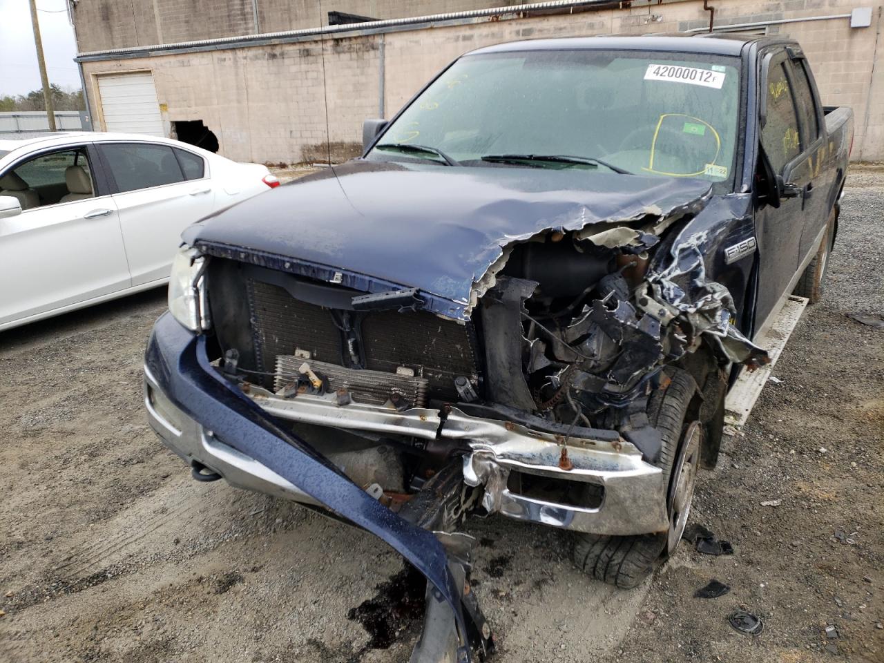 Photo 9 from auction – 2004 FORD F150 with VIN 1FTRX14W34NC00158