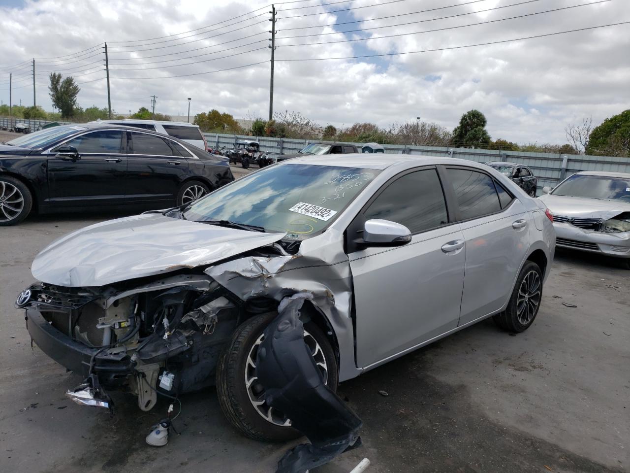 Photo 2 from auction – 2015 TOYOTA COROLLA L with VIN 5YFBURHE8FP292853