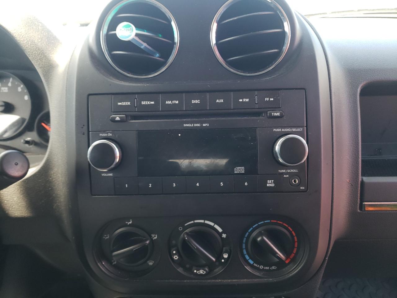 Photo 9 from auction – 2009 JEEP PATRIOT SP with VIN 1J4FF28B49D223233