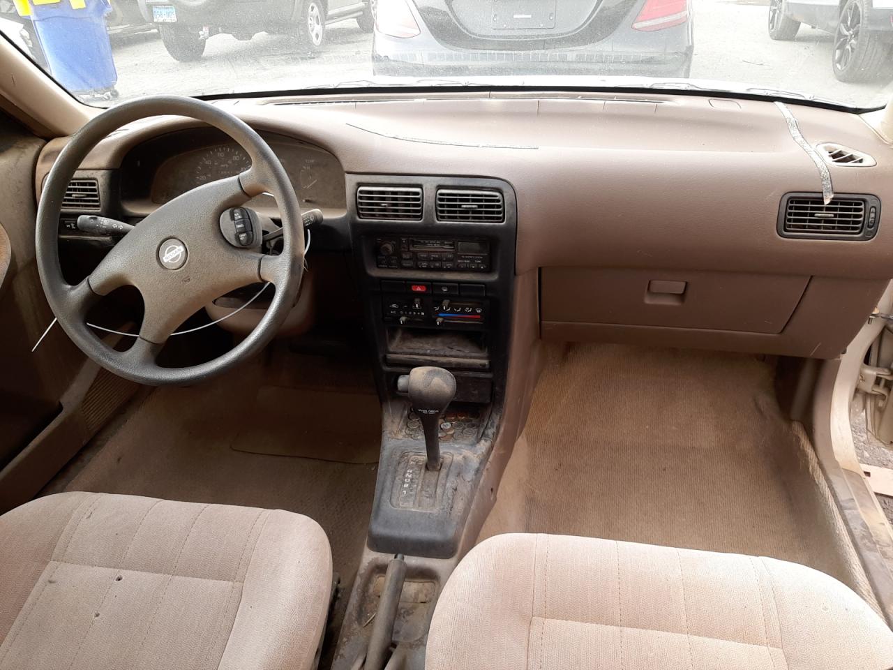 Photo 9 from auction – 1994 NISSAN SENTRA E with VIN JN1EB31P4RU323330