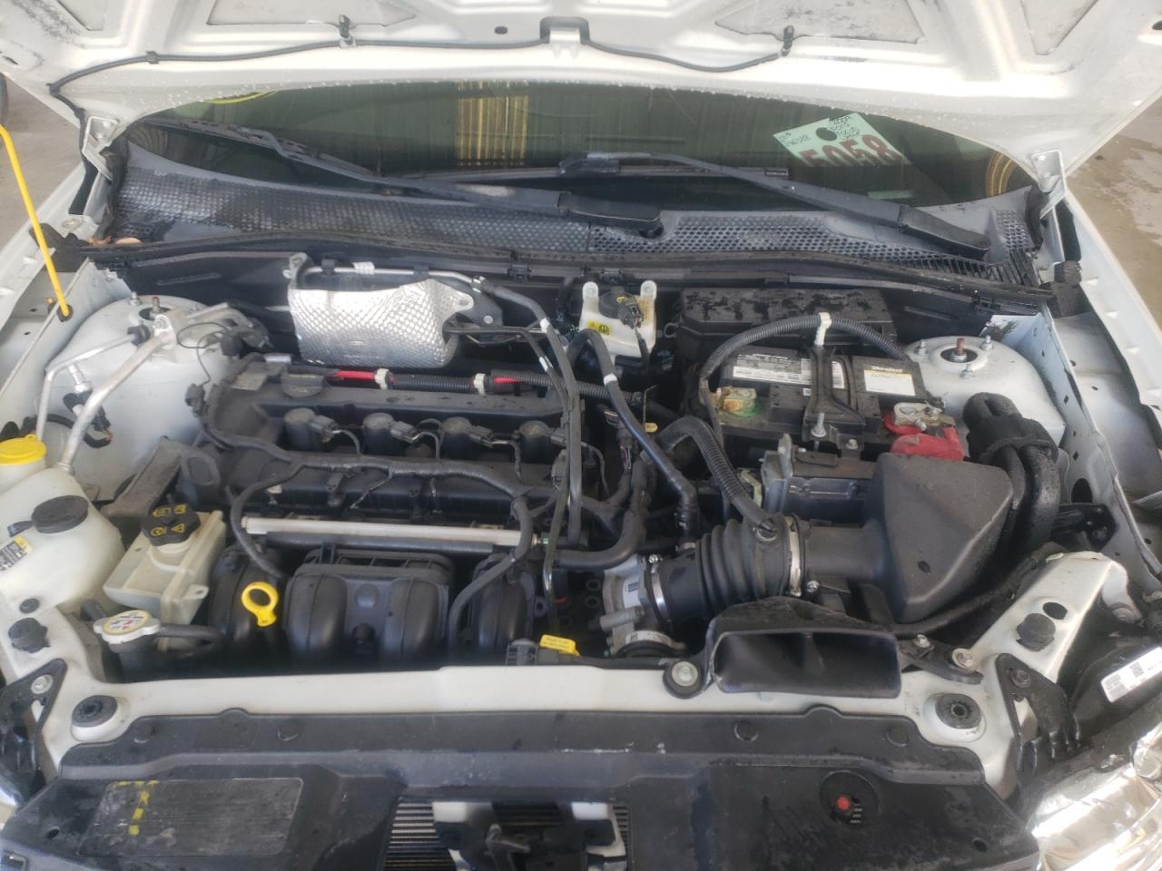 Photo 7 from auction – 2009 FORD FOCUS S with VIN 1FAHP34N19W196388