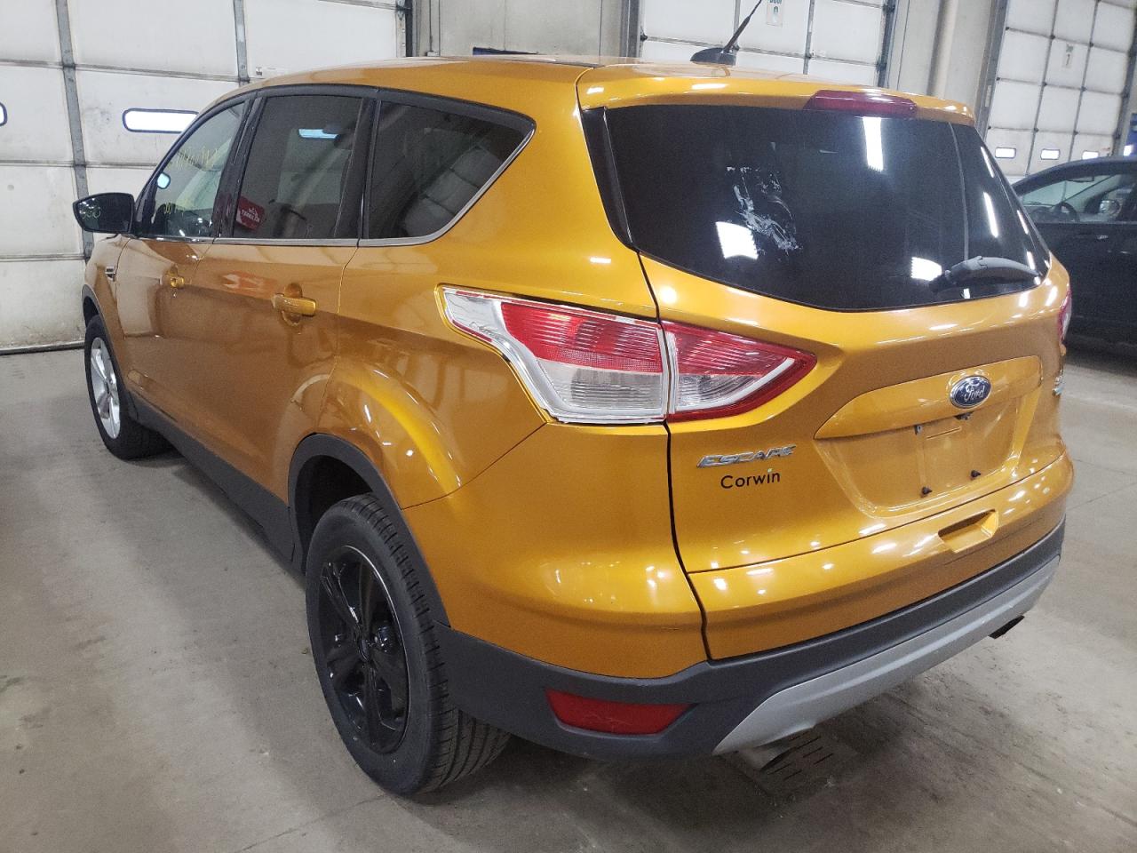 Photo 3 from auction – 2016 FORD ESCAPE SE with VIN 1FMCU9GX9GUC61182