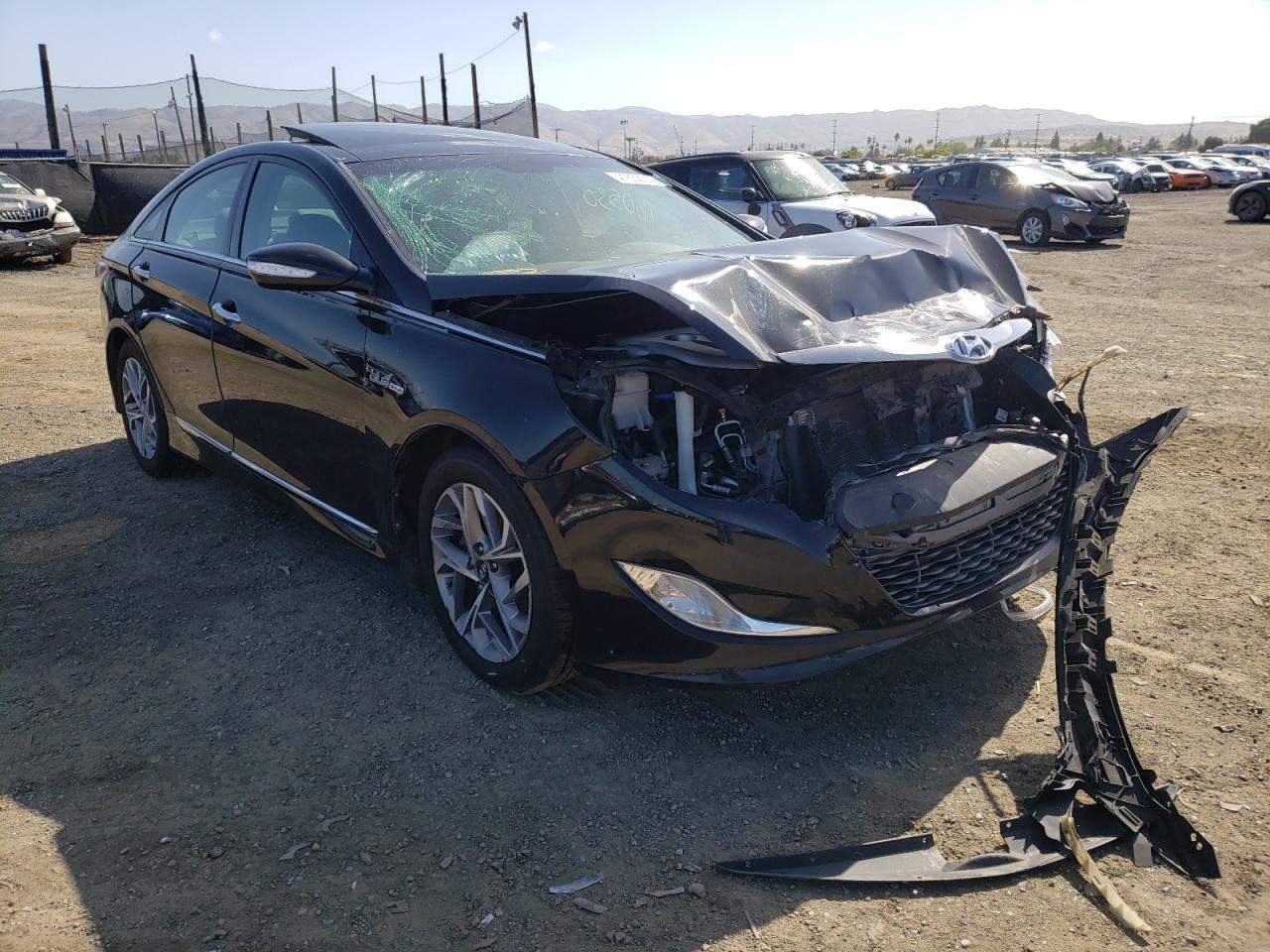 HYUNDAI SONATA HYB 2015 with VIN KMHEC4A48FA136509 - Photo from auction