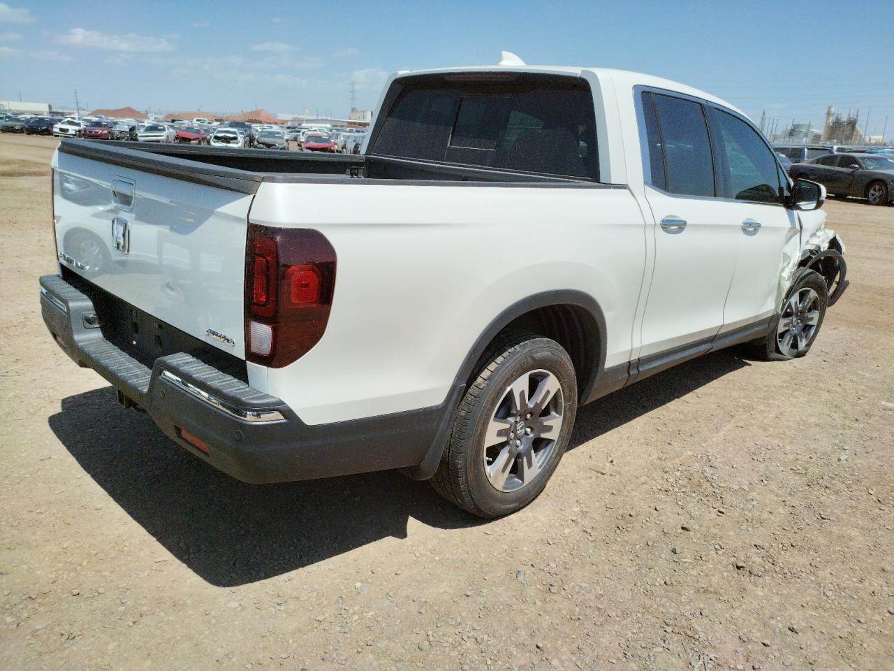 Photo 4 from auction – 2019 HONDA RIDGELINE with VIN 5FPYK3F73KB025540