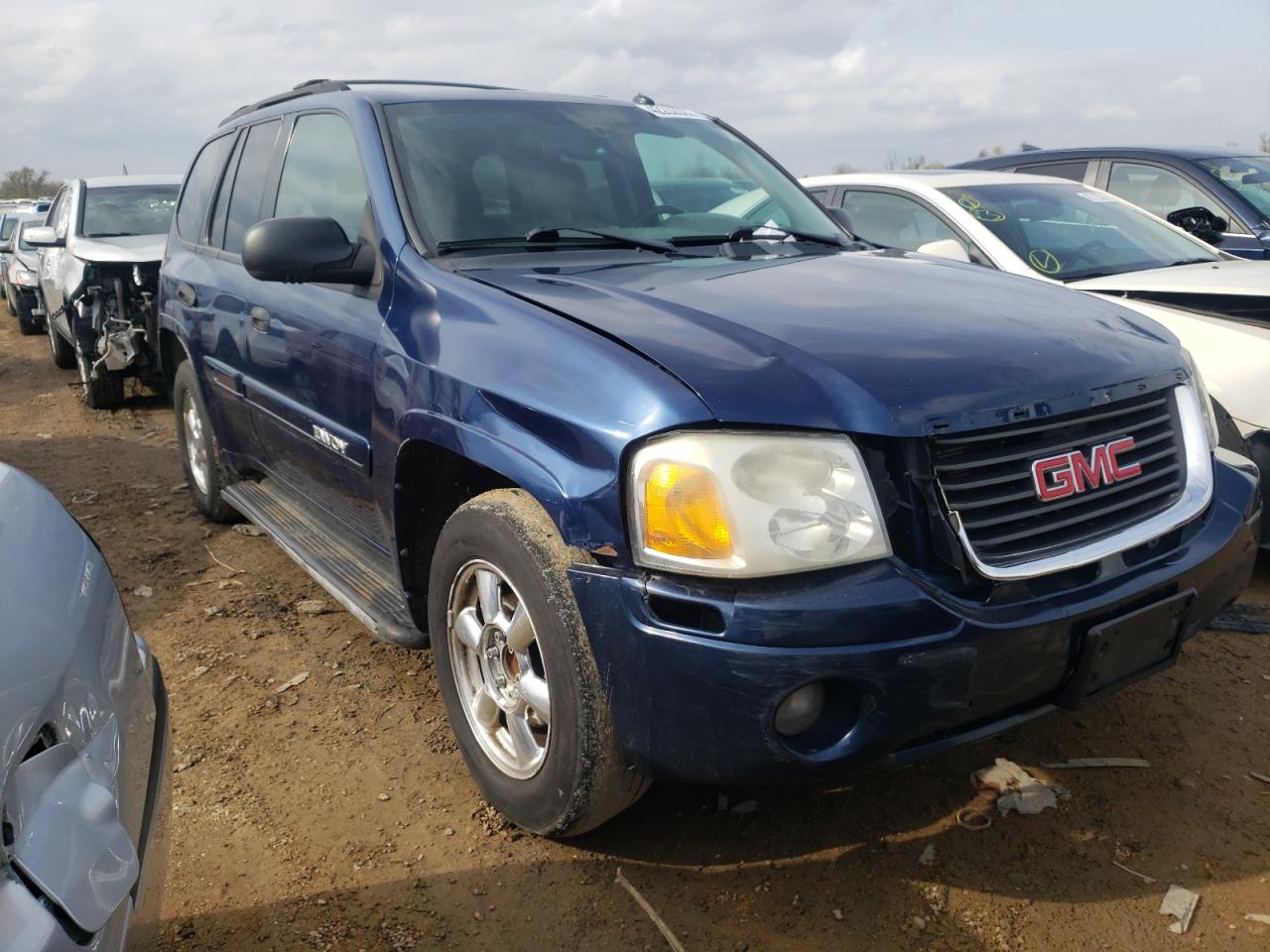 GMC ENVOY 2004 with VIN 1GKDS13S542351709 - Photo from auction