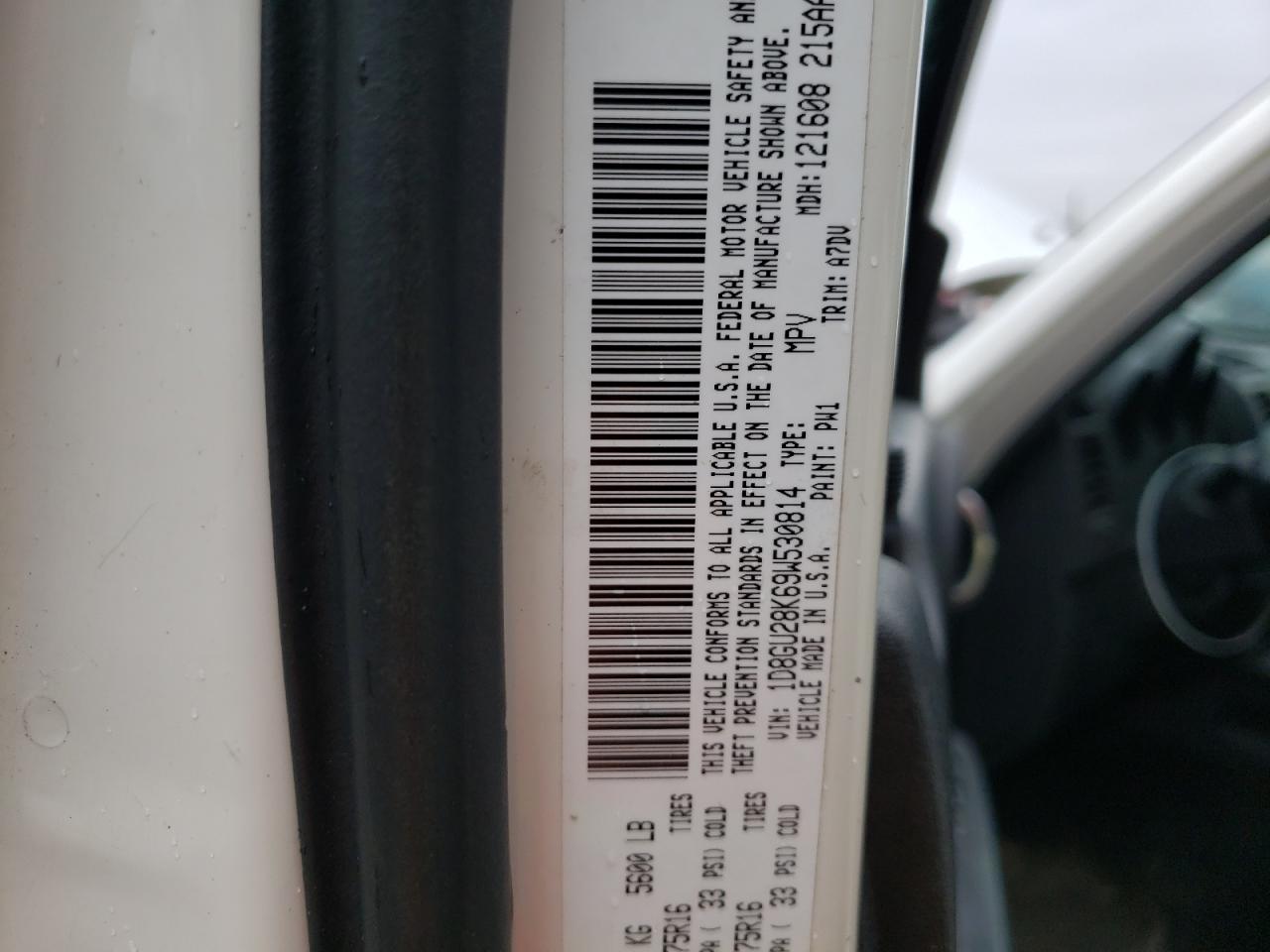 Photo 10 from auction – 2009 DODGE NITRO SE with VIN 1D8GU28K69W530814
